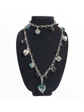 Silvertone long infinity fashion charm station necklace